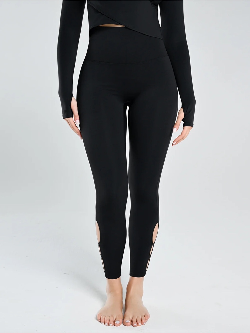 High-Rise Black Performance Leggings with Ankle Cutouts